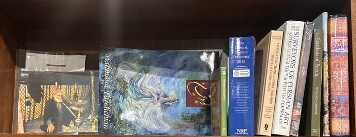 A collection of books depicting Persian culture