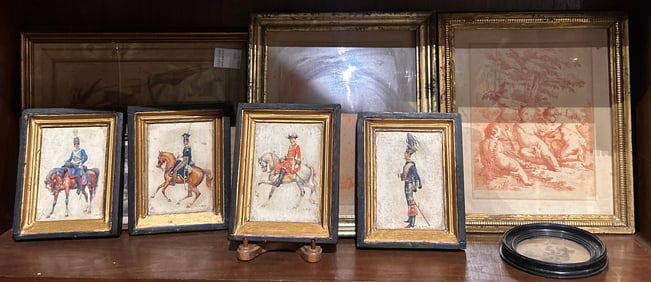 A group of nine framed prints