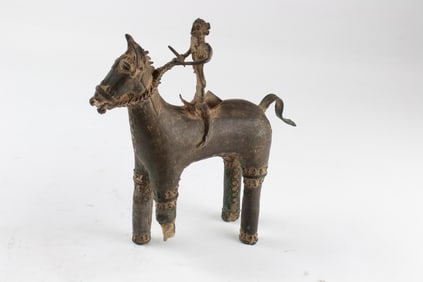 An Indian or Benin metal horse and rider