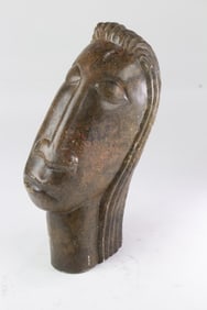 An African stone bust, probably Shona, signed Ftirivaneffel, 9"h