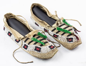 Two pairs of Plains beaded moccasins
