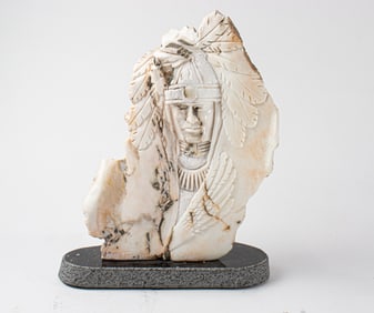 A Mike Toledo carved stone relief portrait