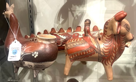 A lot of three Pre columbian style animals, including a bull and a dinosaur