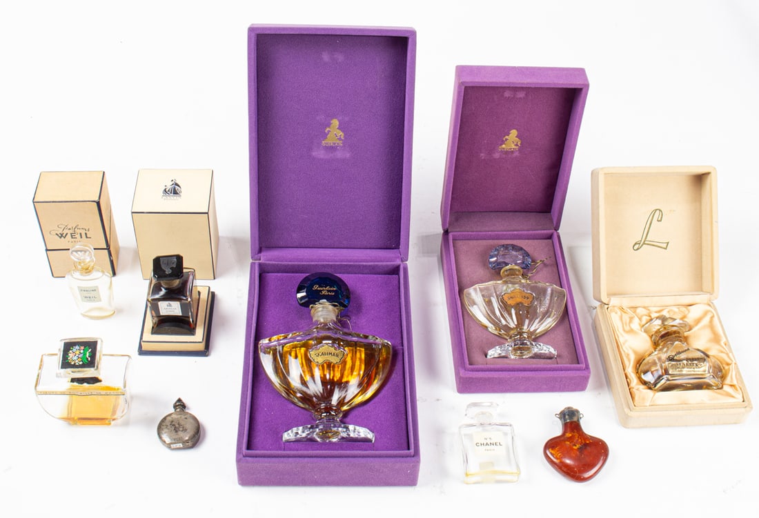 A collection of vintage perfume bottles: A collection of vintage perfume bottles, including Lynette 'Spellbound'; Lavin 'Arpege Extrait'; Parfums Weil 'Zibeline'; (2) Guerlain 'Shalimar'; 'Fleurs de Rocaille de Caron'; Chanel 'No. 5' and (2)
