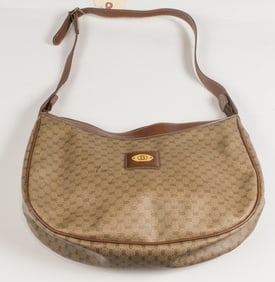 A vintage Gucci monogram coated canvas 'Ophisi' hobo shoulder bag