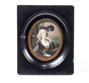 An Italian miniature portrait of a woman within ebonized wood frame