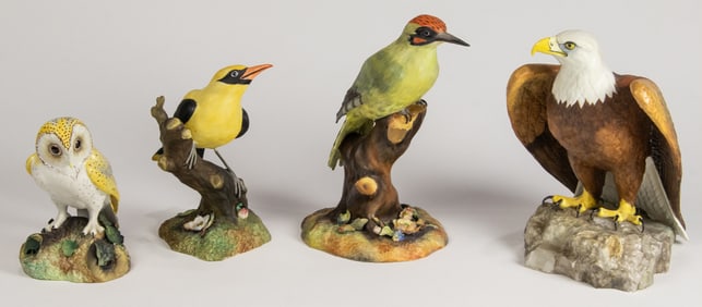 A group of four Royal Crown Derby porcelain birds