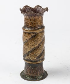 A Trench Art hammered copper vase with weighted base, 7.5"h