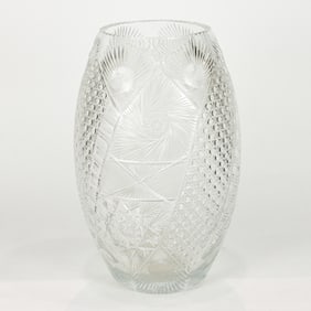 A large cut glass vase in the American Brilliant style