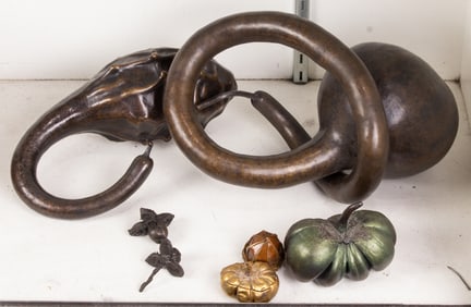 A collection of mainly bronze gourds