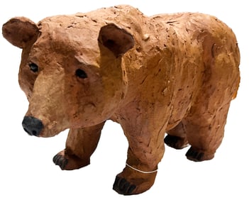 A stoneware figure of a bear
