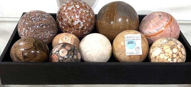 A collection of ten specimen stone orbs or eggs
