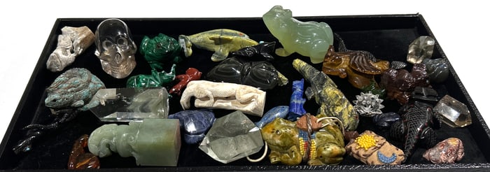 A group of frog and other animal carvings/fetishes