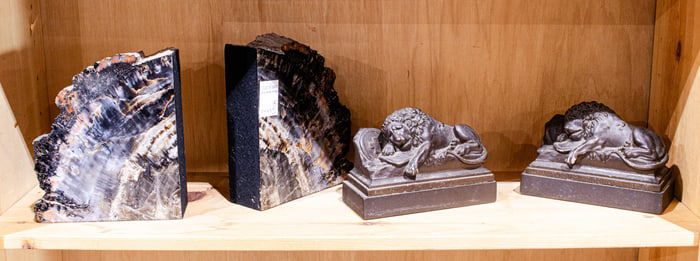 Two pairs of bookends including petrified wood