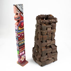 A Leland Holiday (Navajo) painted totem and a tall basket