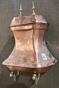 A French Provincial copper lavabo with brass spigots