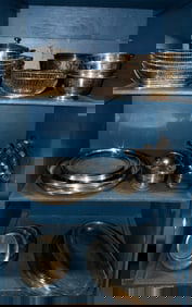 A large group of silver plated and stainless steel catering accessories
