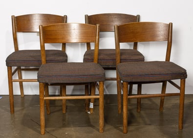 A set of four Mid-Century Modern teak dining chairs