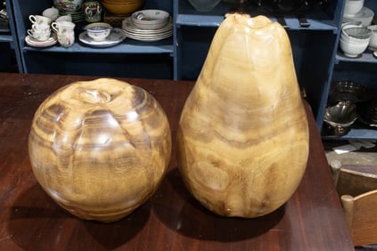 Two large scale carved wood studies of a fruit