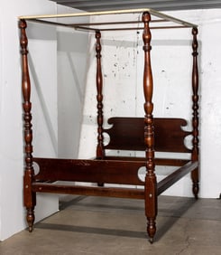 A Chippendale style four poster full size four poster bed