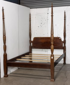 A Classical style four poster bed