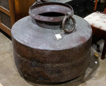 A large Gujarat Indian hand hammered copper pot