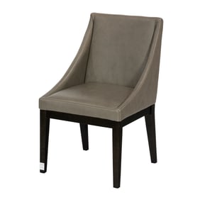 A West Elm dining chair with slope arms