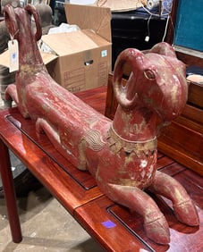 A Southeast Asian carved and partial gilt double ram sculpture