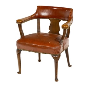 A Chippendale style barrel armchair