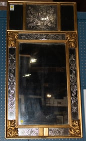 A Regency giltwood mirror with reverse engraved panels