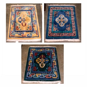 A group of three Tibetan carpets