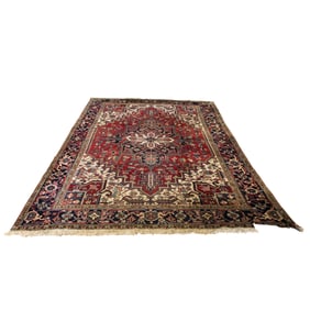 A Persian Heriz carpet