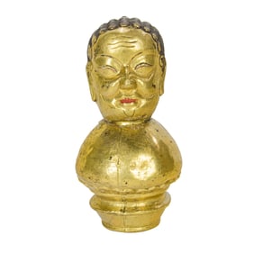 A Tibetan gilt metal head-form box