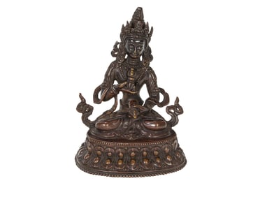 A Tibetan bronze figure of Vajrasattva