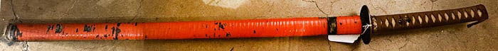 A Japanese katana in gunto mount