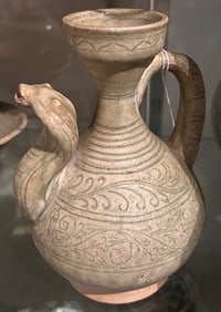 A Chinese export celadon glazed ewer