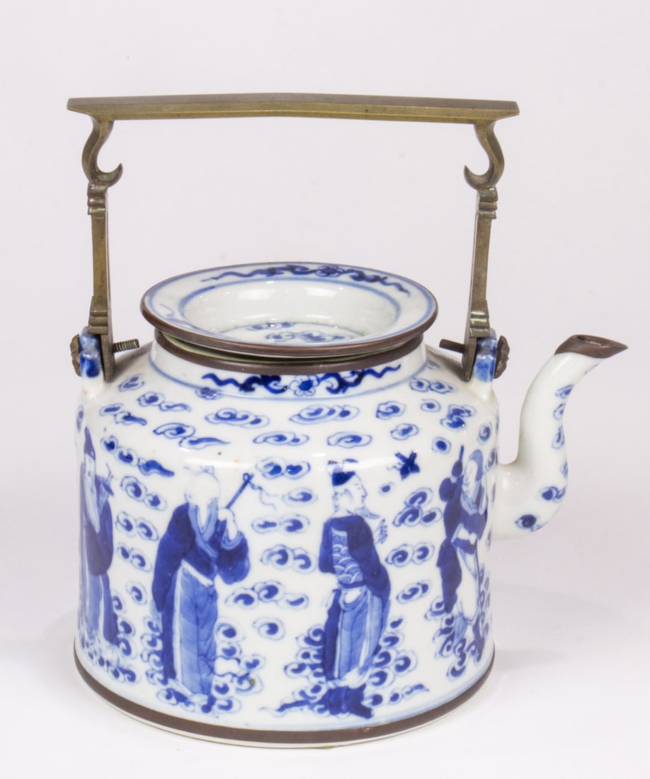 A Chinese blue and white 'Eight Immortals' teapot (1 of 2)