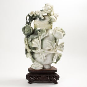 A Chinese jadeite vase with stand