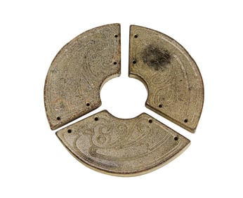 A Chinese three-part archaistic jade bi disc