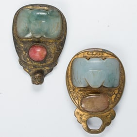 A Chinese gilt bronze and jade inset belt hook and buckle set