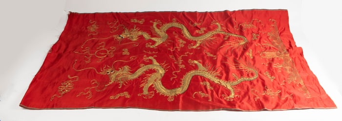 A Chinese embroidered and gilt thread 'dragon' panel