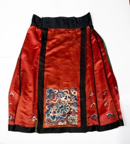 A Chinese embroidered red-ground lady's skirt