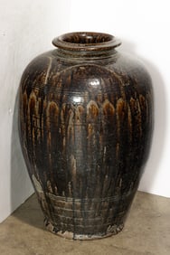 A Chinese brown glazed jar