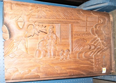 A Japanese hardwood carving panel