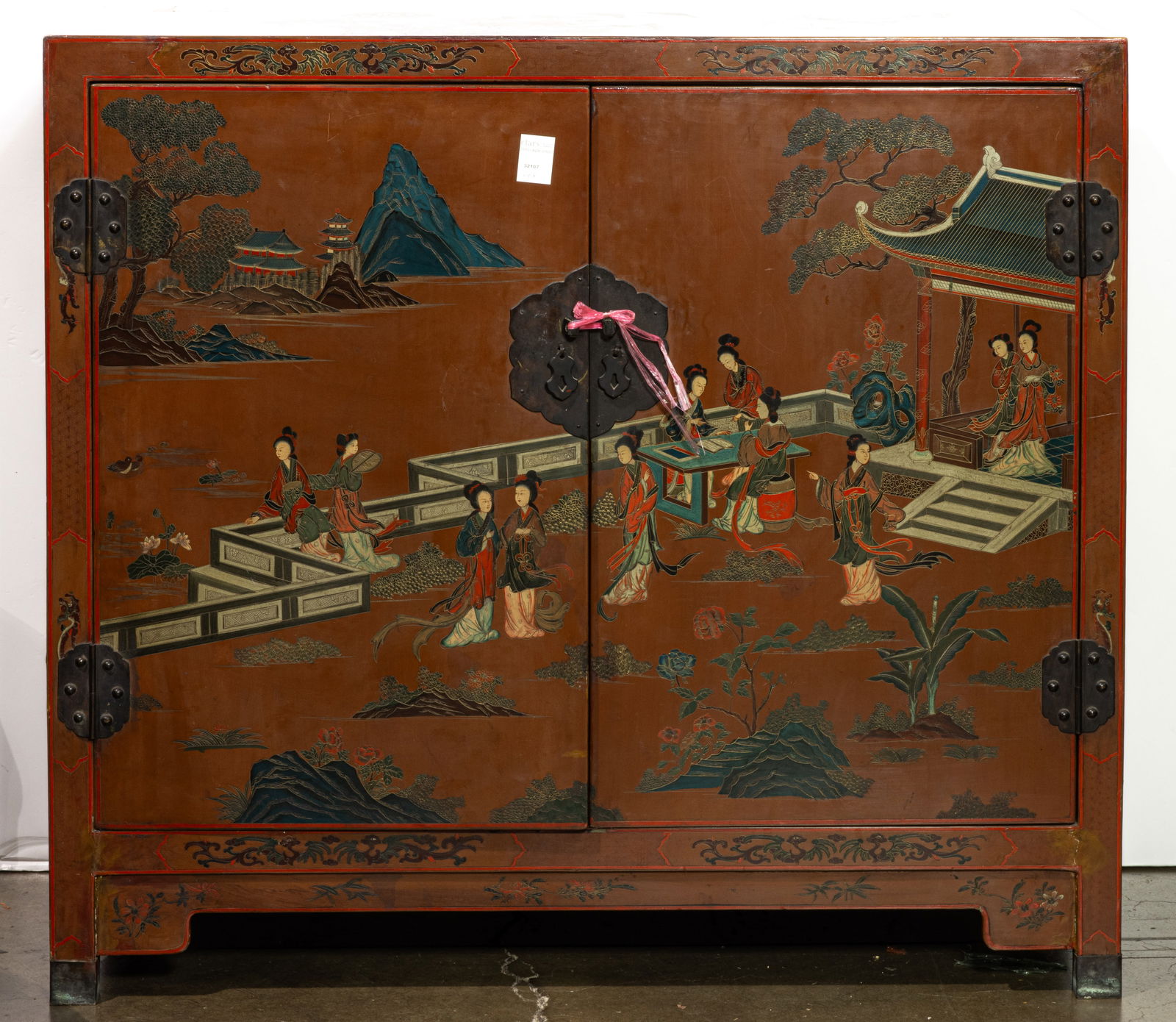A Chinese lacquer cabinet with engraved design cabinet (1 of 1)