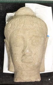 A Chinese sandstone Buddha head