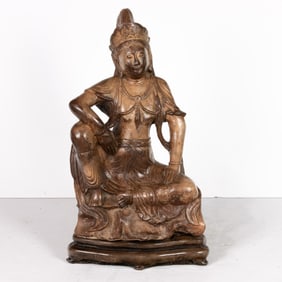 A Chinese stone carving of Guanyin