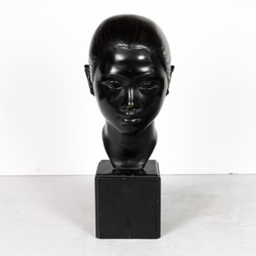 A Japanese bronze boy head