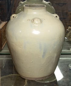 A Chinese white-glazed jar