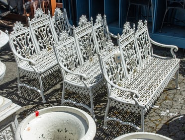 A suite of American Victorian cast iron outdoor garden benches 19th century